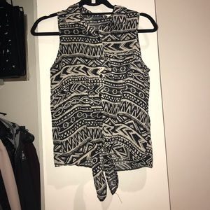 Sleeveless button up blouse